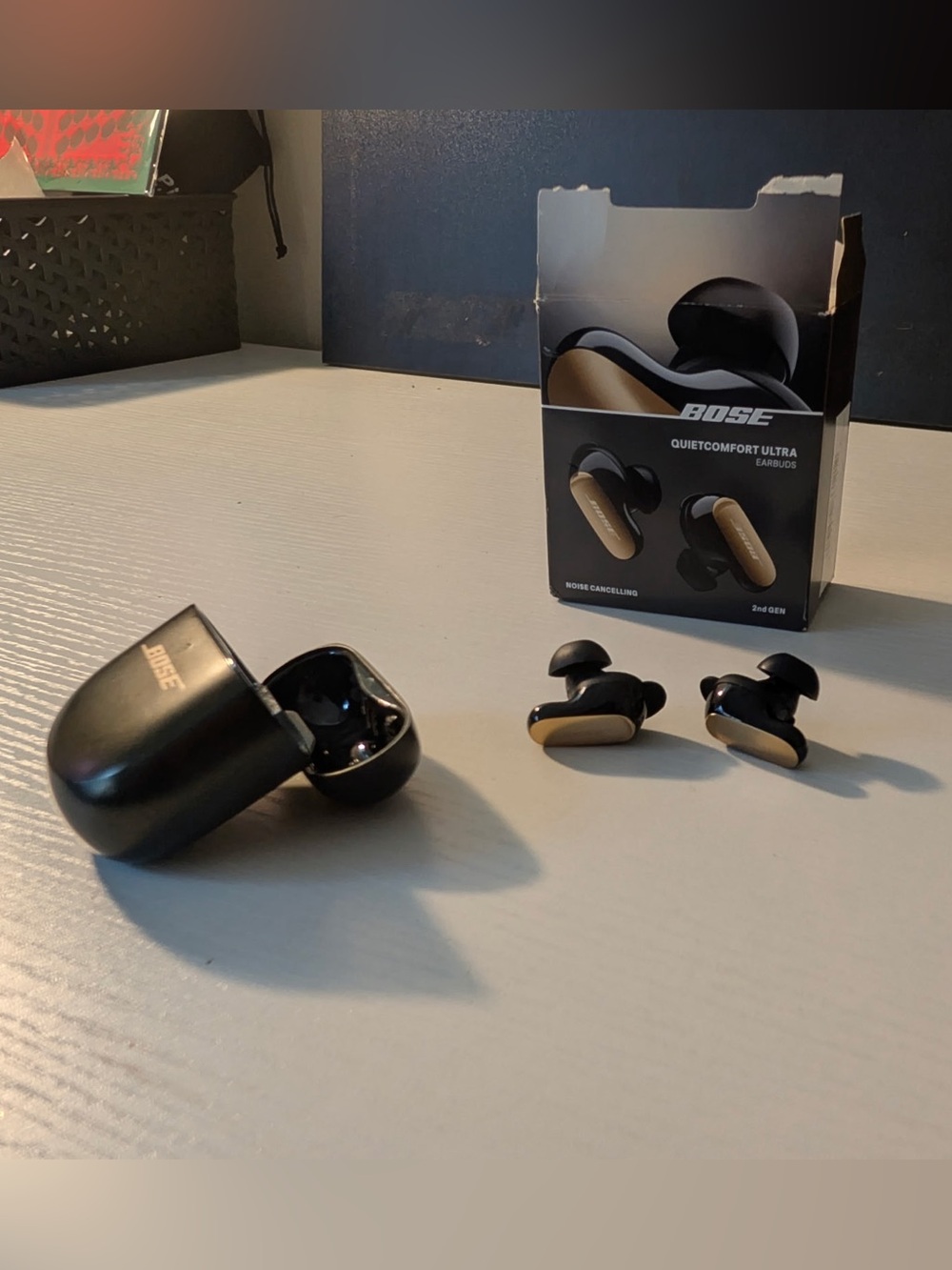 Bose QuietComfort Ultra Earbuds in Black with Gold Accents